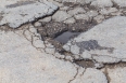 Hole in street asphalt