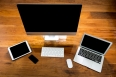 Computer ,laptop , tablet , smart phone on wood table