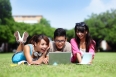 Happy College students using computer