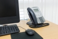 telephone and computer on table work of room service office